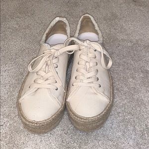 Cream platform sneakers with roping detail